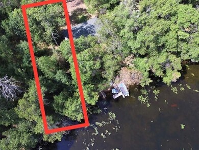 Marking shows approximate lot markers ( Not to scale). There is 102 ft of lake front.