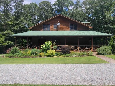 View of front of house featuring covered porch and