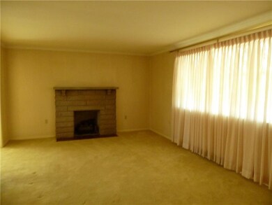 Living room with gas log fireplace