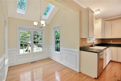 Eat in area of kitchen overlooking private backyar
