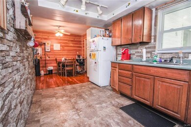 Stone wall accent in kitchen area