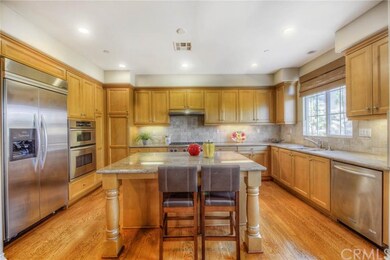 Imagine cooking in this gourmet kitchen while ente