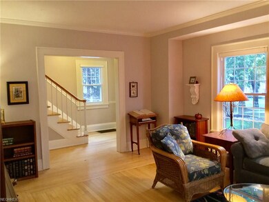 Living room with view of entrance hall.
