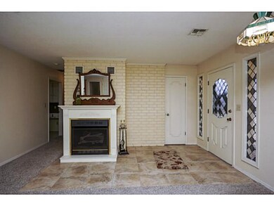 Living Room. Beautiful ceramic tile and cozy firep