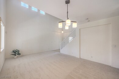 Living room with new carpet showcases a large spac
