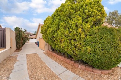 View of side of property featuring stucco siding