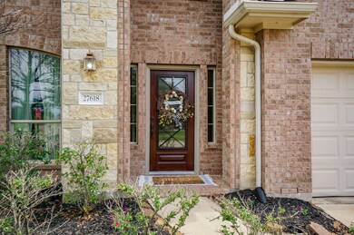 Gorgeous front door and welcoming entry featuring