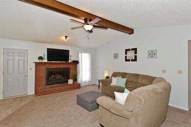Another view of the Living Room w/door to nice cov