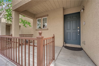Entrance to property featuring stucco siding