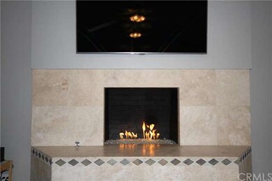 Custom fireplace in the great room. Gas burning, w