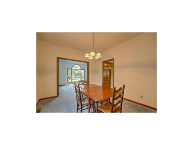 Formal dining room with easy access to kitchen.