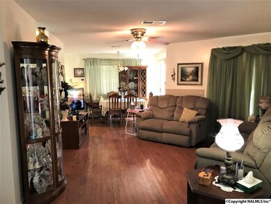 NICE, COZY LIVING ROOM WITH FIREPLACE AND CEILING FAN.  VERY SPACIOUS !!!!