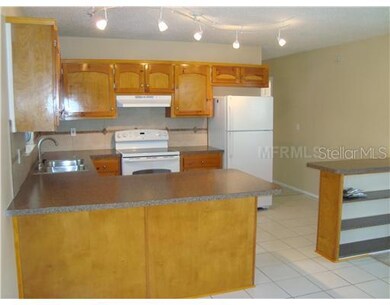 Kitchen - Remodeled kitchen with new appliances, new countertops, new faucet and new lighting