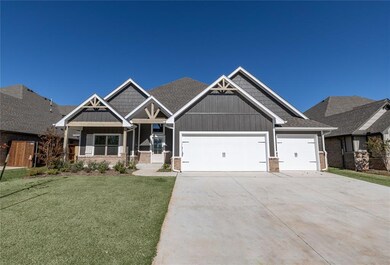 Craftsman inspired home with a garage and a front 