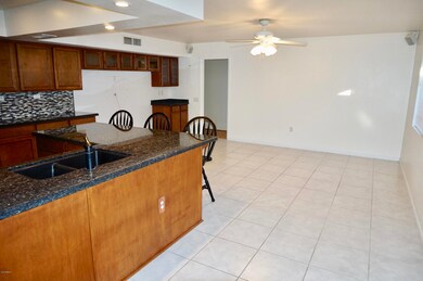 9719 W Wrangler Dr, Sun City, AZ 85373 - photo 5