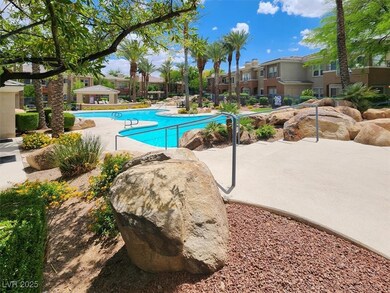 Community pool featuring a residential view and a