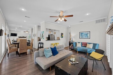 Living room featuring ornamental molding, visible