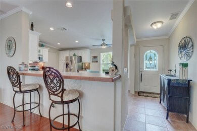 Kitchen with kitchen peninsula, appliances with st