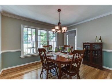 Spacious dining room with refinished hardwoods, ne