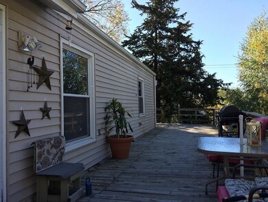 Huge deck on the west side for both sides to enjoy