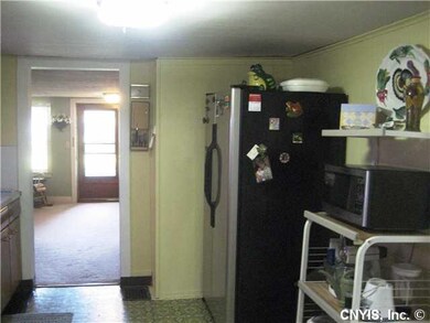Kitchen. Kitchen leading to living room.