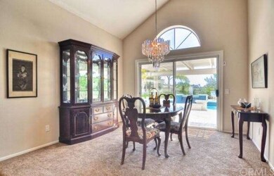 Freshly Painted And Carpeted Dining Room With View