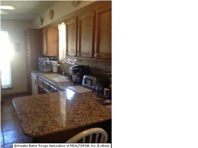 Granite counter top with breakfast bar and slide o