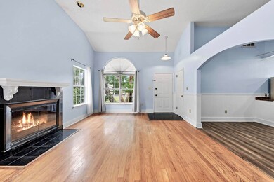 Living room flooded with natural light.