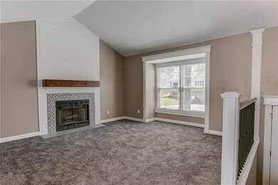 Continue to the great room featuring a vaulted cei