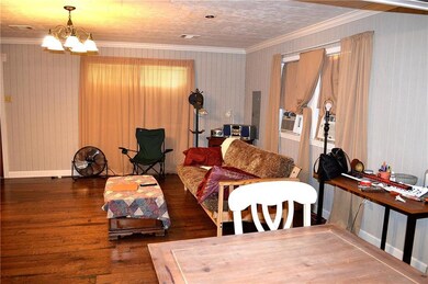 Living room w/two window units