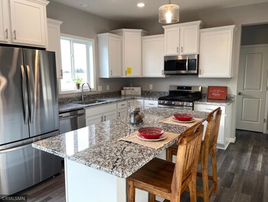 Lots of cabinetry and large island provides lots of space