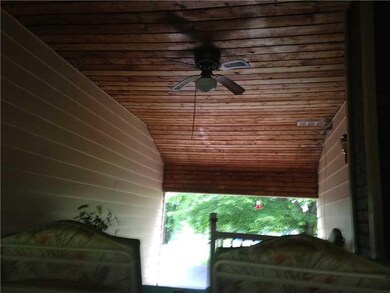 Patio/Deck. Breezeway between house and garage. Ce