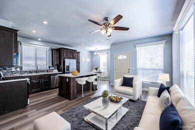 This photo features a virtual staging effect. The property is vacant.