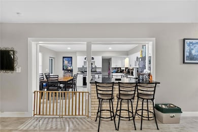 The granite counters and breakfast bar a perfect for a quick meal.