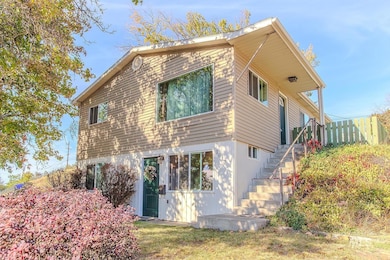 View of front of property with stairway