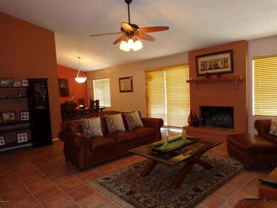 Living room opens to dining area