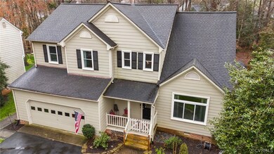 View of front of home featuring covered porch and