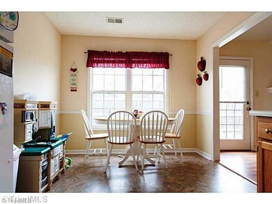Breakfast. Eat-In kitchen overlooking the private patio area...