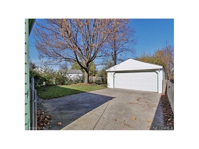 Fenced back yard with driveway double gates. 30'?2