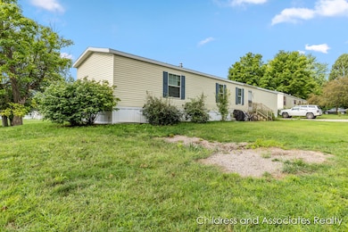 12811 Charles Dr, Wayland, MI 49348 - photo 2