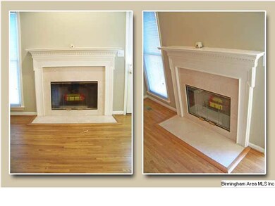 Check out the handsome wood burning fireplace just