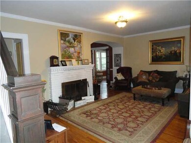 Living Room. Living room with open staircase to th