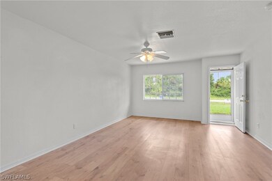 1206 Jaguar Blvd, Lehigh Acres, FL 33974 - photo 7