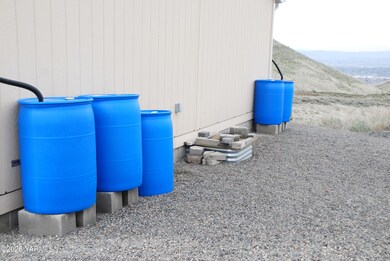 7) Rain Barrels