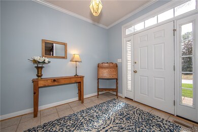 Come on in! Foyer with transom and side light wind