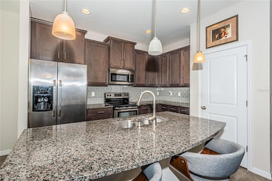 pantry and granite counters in the kitchen