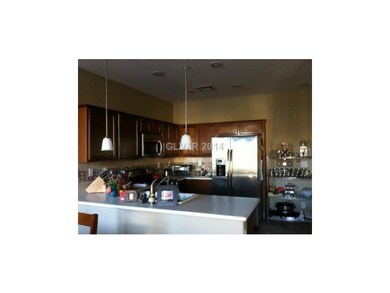 Kitchen. The kitchen opens to the dining and great