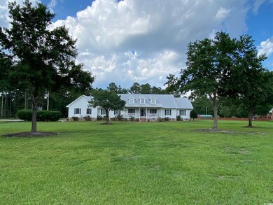 View of front of house with a front yard