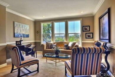 Formal Living room with views and crown molding