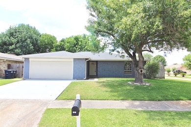 Front view of home, corner lot with mature trees!